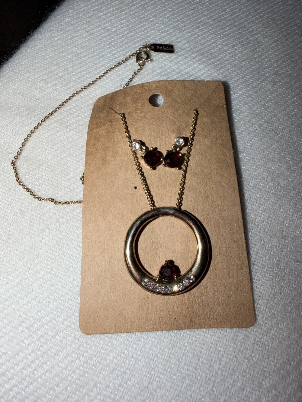 VTG Liz & Co Gold Tone Circle Pendant Necklace with Red Stone Accents
